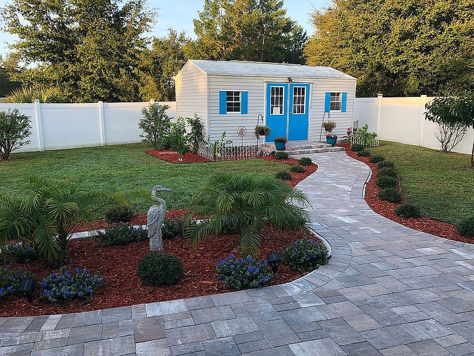 Large Paved area with Shed