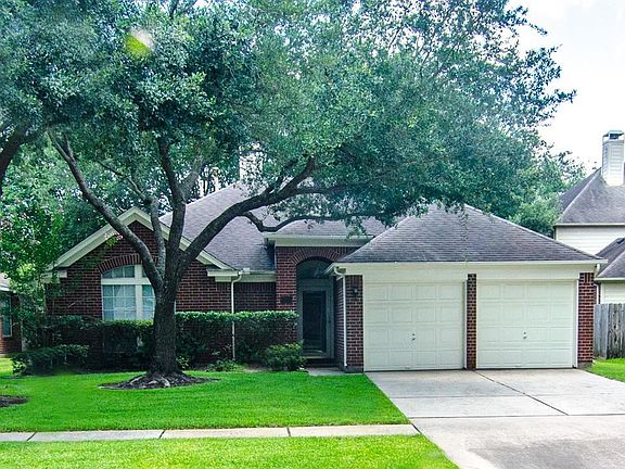 A yard that is just right for up keep.  This home features an underground sprinkler in both front and back yards.