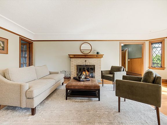 Living room with wood burning fireplace