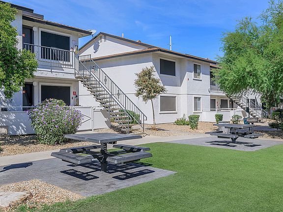 Experience serene living at this beautifully designed apartment complex, complete with outdoor spaces for relaxation.