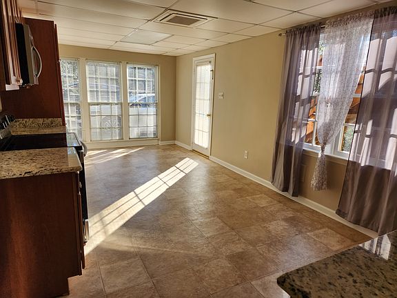 Kitchen - tile floor, main entrance from exterior to apartment.
