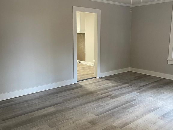 Living room looking into kitchen