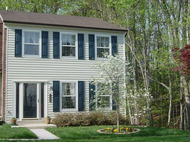 New siding, landscaping, and sod