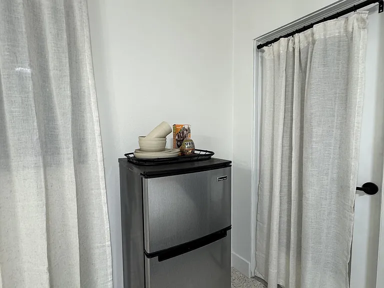 Mini Fridge in Room with freezer