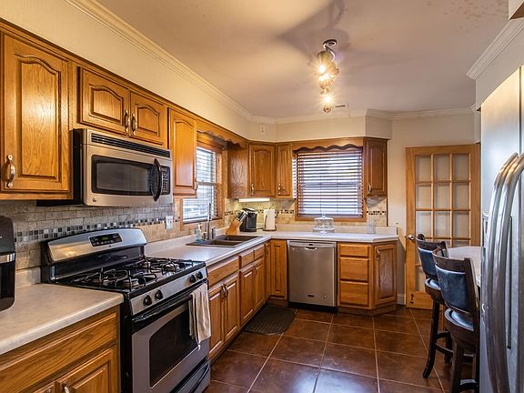 5th image of 12858 S Carondolet Ave