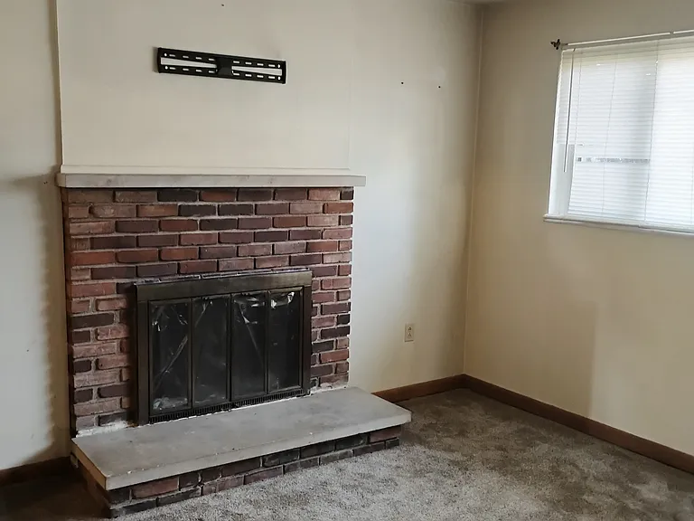 Downstair living-room with fireplace.