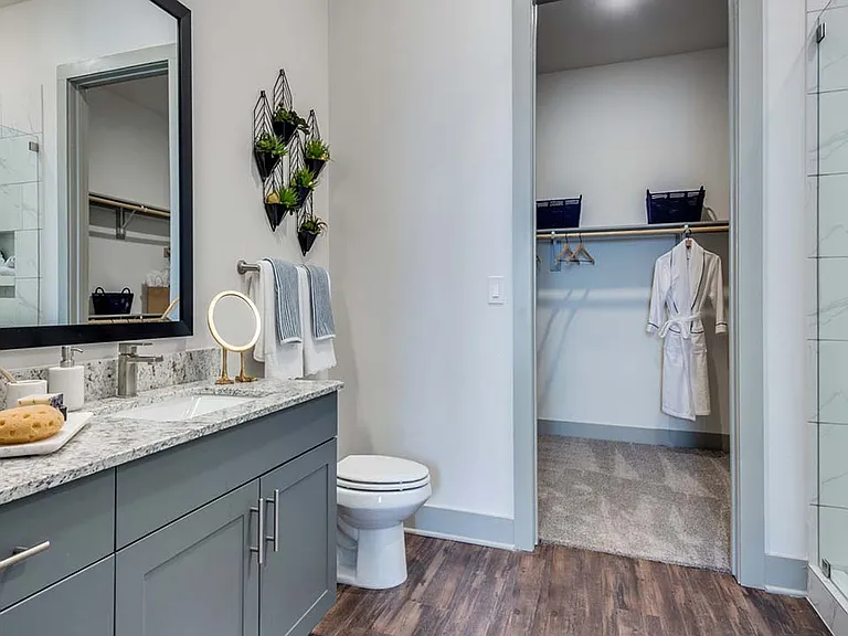 Griffis Frisco apartment bathroom with quartz countertops.