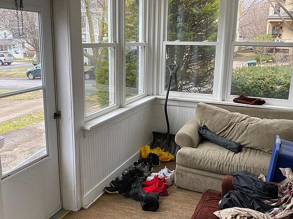 This side porch entranceway is a sun porch.