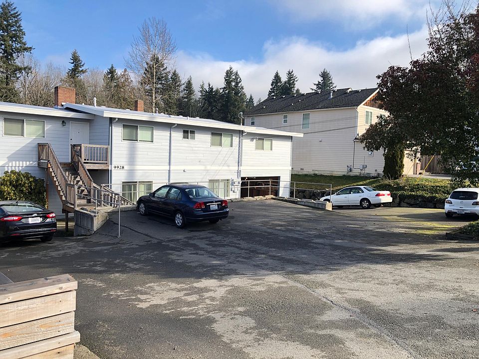 Entrance to unit through stairs. Large driveway provides plenty of parking aside from 2 car garage.