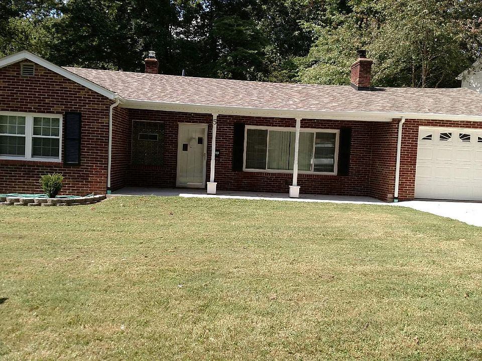 FRONT OF HOME HAS A OPEN FRONT PORCH FOR YOUR ROCKING CHAIRS