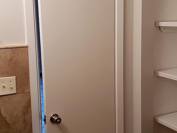 View from inside the bathroom looking out. Towel Closet loca