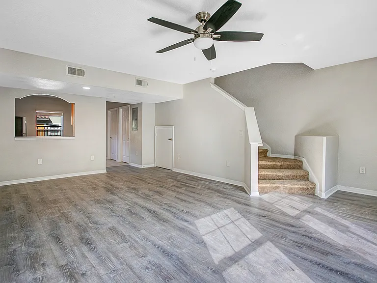 apartment living space with stairs