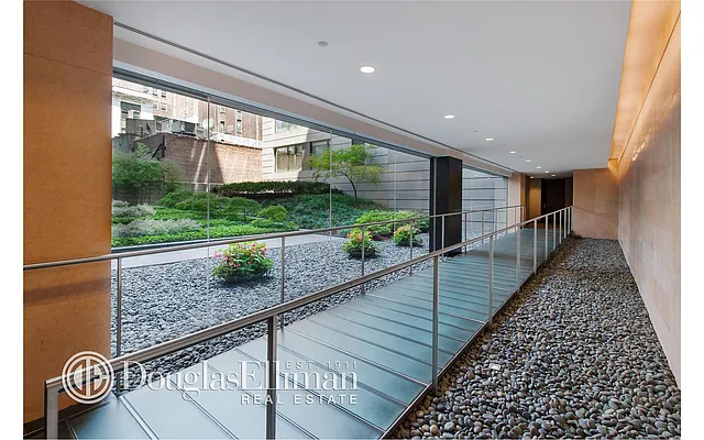 Sold by Douglas Elliman | media 13