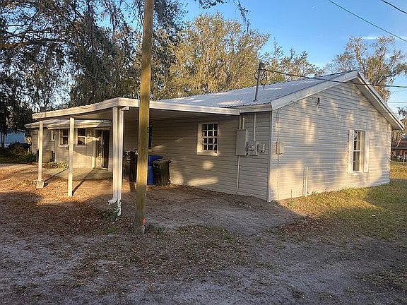 Carport and rear side view.