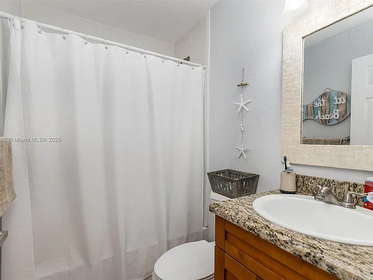 325 Calusa St — Photo 25