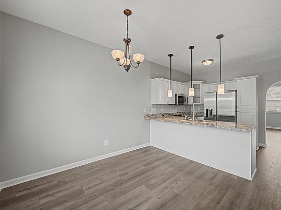 New flooring, appliances, countertops and lighting.