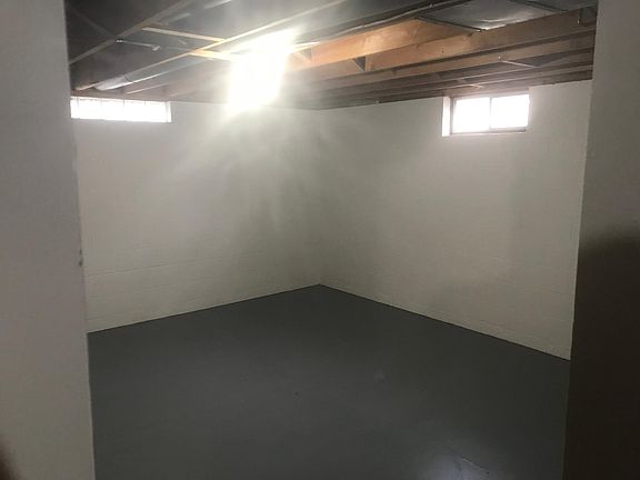 Basement room. Freshly painted throughout home.