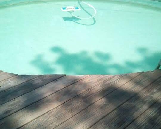 View of pool sitting on deck 