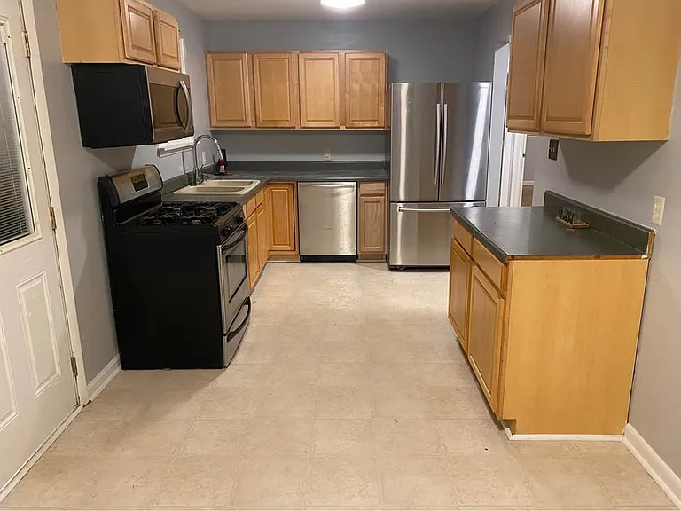 2021 Waters Dr — Photo 3