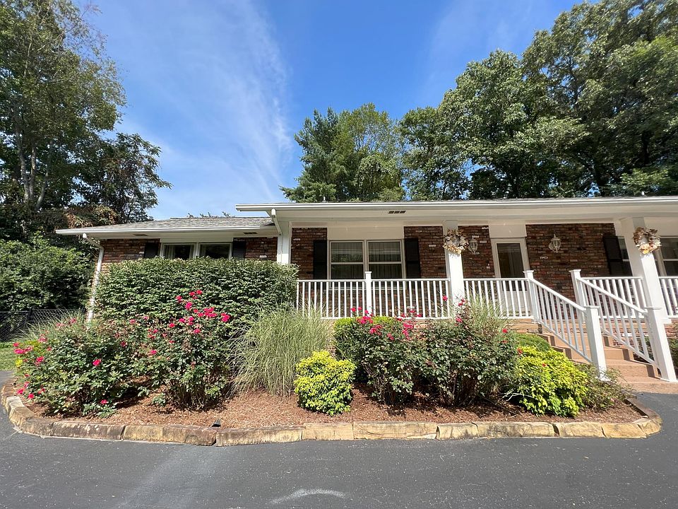 Left side of duplex. Wide front veranda.
