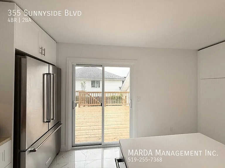 355 Sunnyside Blvd — Photo 17