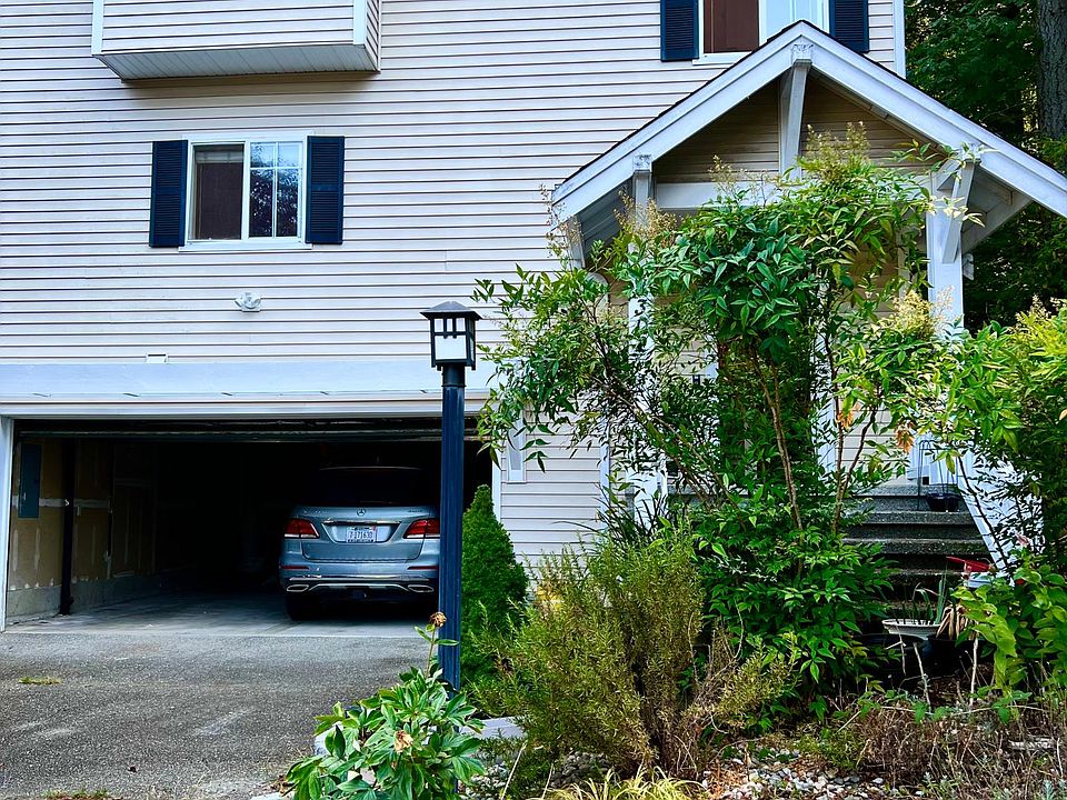 The roomy 2-car garage is very conveniently setup for a side-by-side parking. Two more cars can be parked on the driveway, as well as extra community guest parking a few yards away.