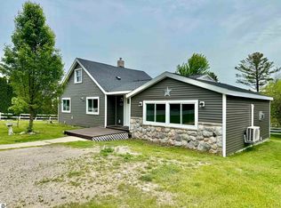 7160 Cherry Ave, Kewadin, MI 49648