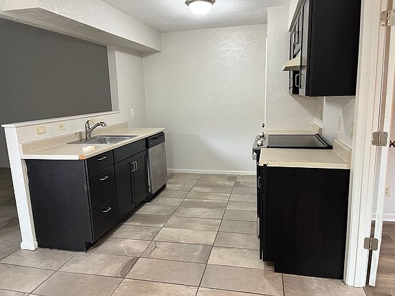 Kitchen looking from dining area