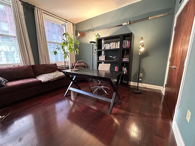 Second bedroom or office space. Includes two closets with custom built in shelving.