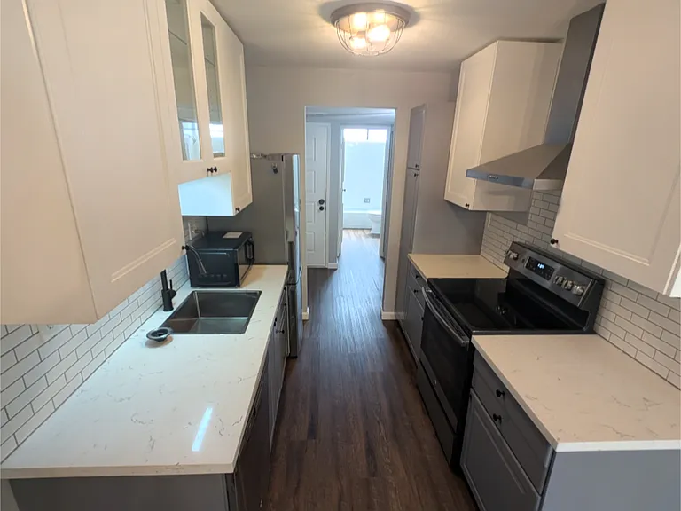 Upper cabinets installed for more storage