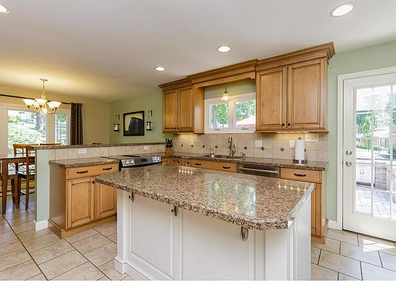 Updated kitchen with glazed maple cabinets