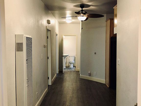 walk in to living room ..1st & 2nd rooms on left, 1bathroom at each end of hall (2 in total), 3rd room on right, kitchen in center of home, 4th room right of kitchen .