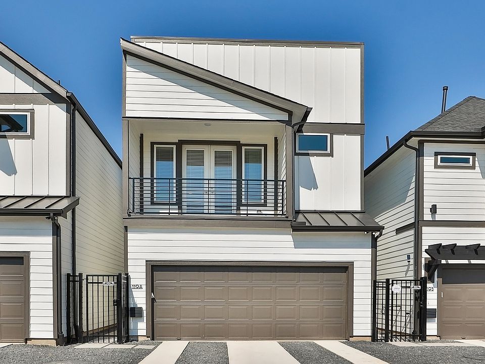 Sleek metal accents and spacious design elevate this Independence Heights townhouse to modern luxury