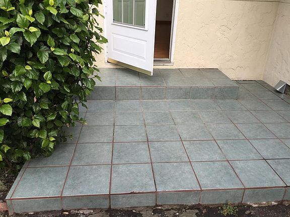 tile floor in front of unit