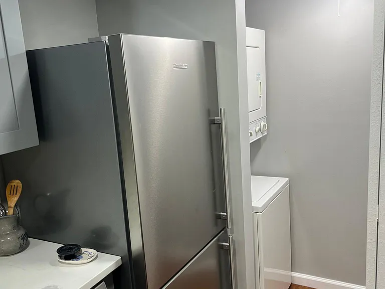Dedicated laundry / storage room