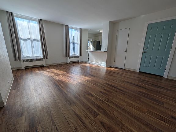 Living room facing kitchen