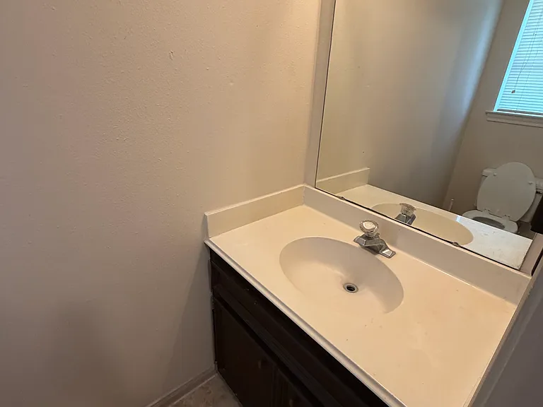 Half Bathroom off Laundry Room