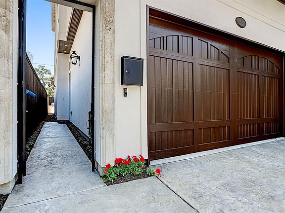 ENTRY WITH LOCK. GARAGE DOOR RECENTLY REFINISHED