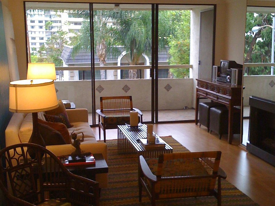 Living room. Older picture but shows balcony and view.