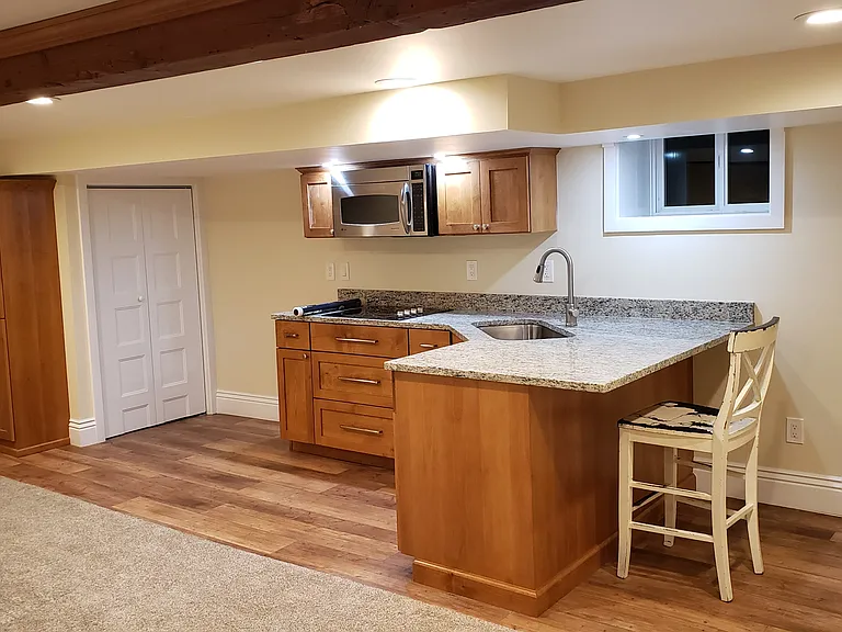 The Downstairs Kitchenette is separate from the main floor. Offering a great roommate options.
