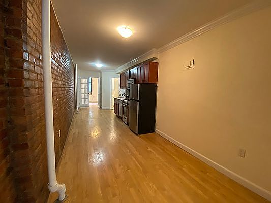 1st image of 511 E 12th St APT 1F