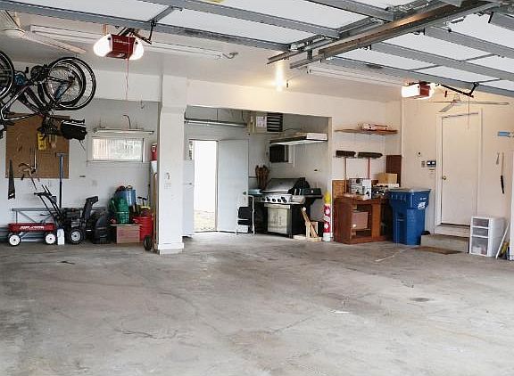 Awesome 'Man Cave' 3 car heated and cooled garage