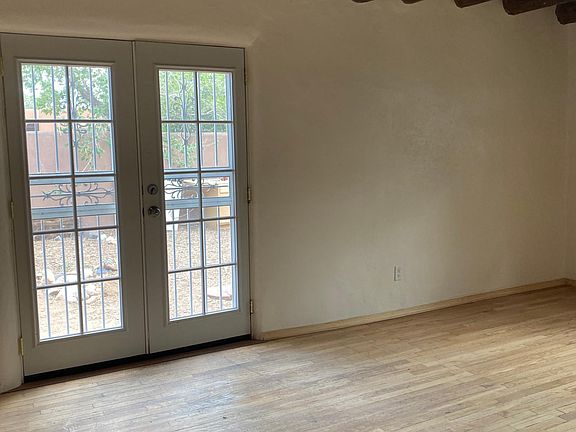 French doors lead to private back yard and side yard area- great for pet.