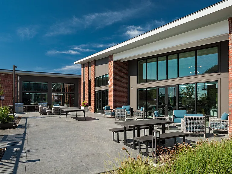 Poolside Outdoor Lounge with Fireplace and Grills