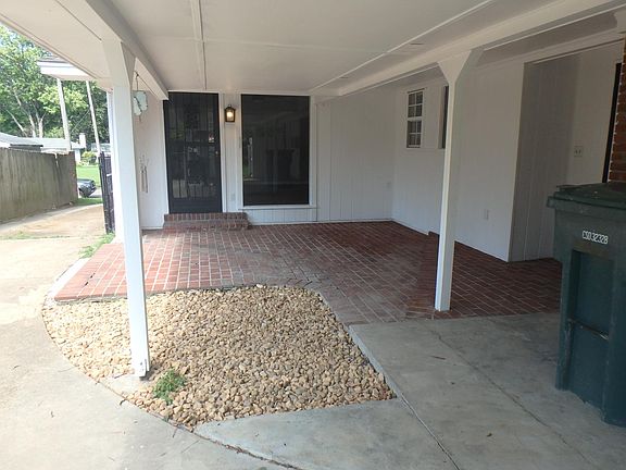 Patio with connections to double garage