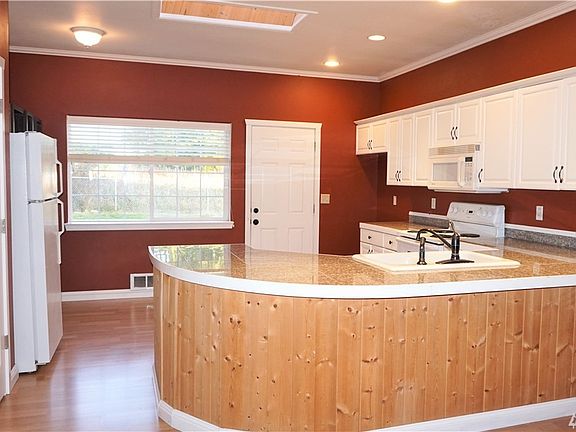 I'm moving the fridge back into kitchen area. It's in the kitchen eating space in this picture.