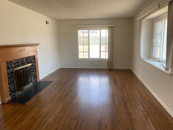 Front Living room. Decorative Fireplace