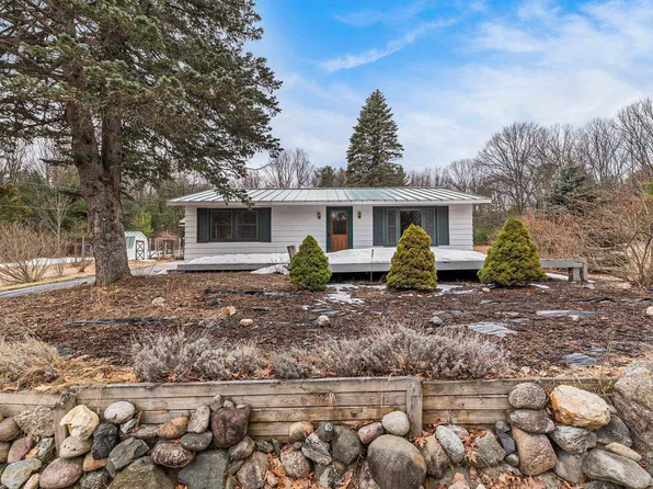 12060 SW Torch Lake Dr, Rapid City, MI 49676