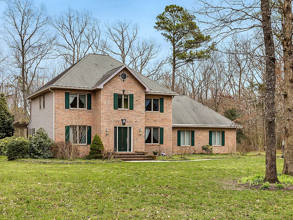 1st image of 10 Whispering Woods Dr