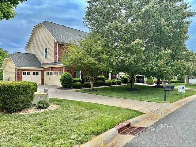 Front of home with 3 car garage - 1210 Oleander Ln